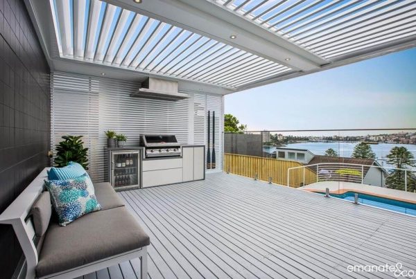 "Spacious alfresco outdoor kitchen with an opening roof in the Northern Beaches."
