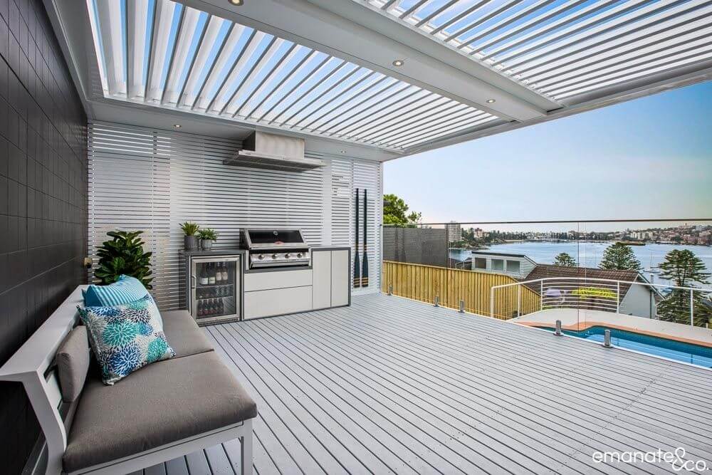 "Spacious alfresco outdoor kitchen with an opening roof in the Northern Beaches."