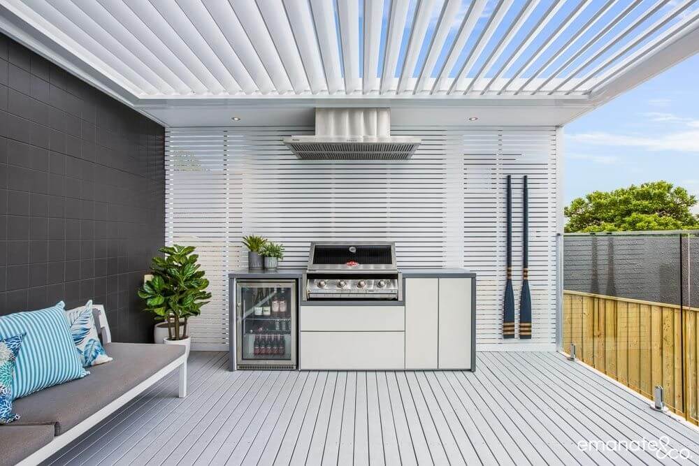 "Luxury outdoor kitchen and alfresco area with scenic coastal views in the Northern Beaches."
