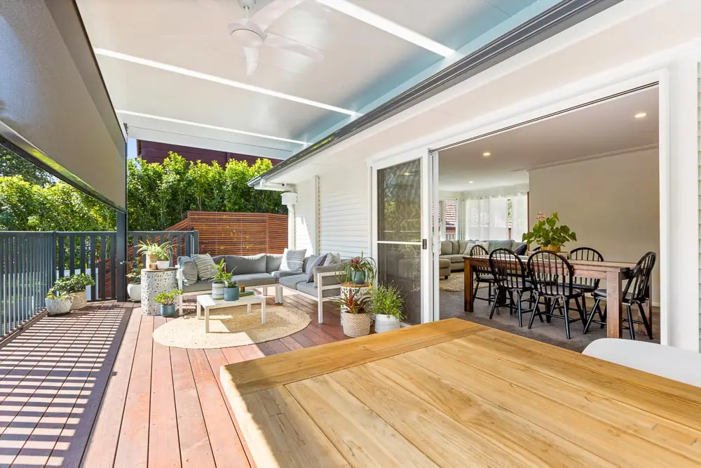 Bushfire compliant deck in Thornleigh with patio roof and timber seating for outdoor dining