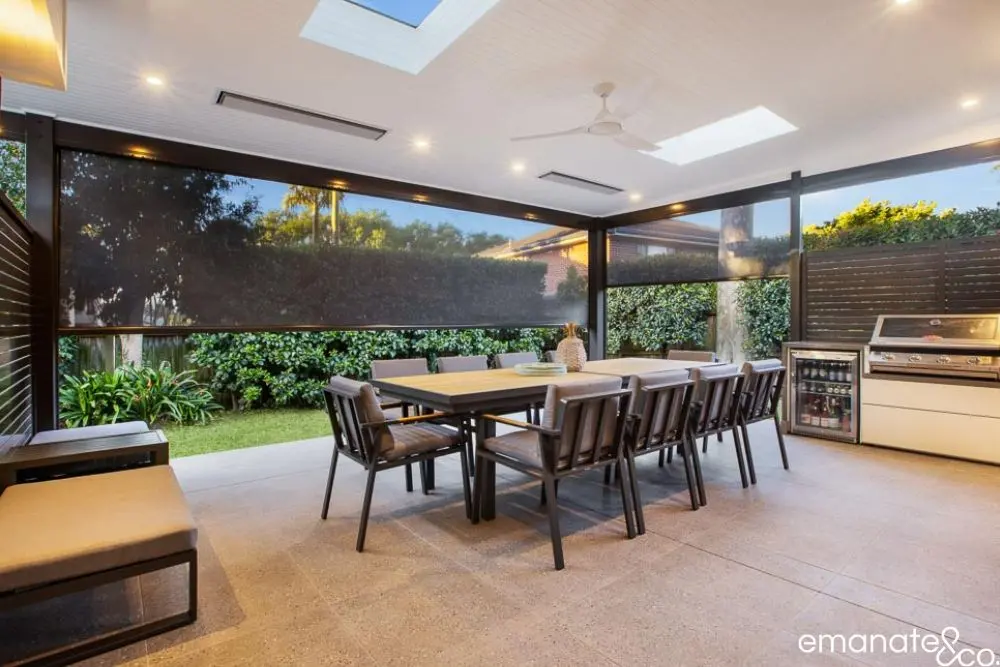 Close-up of a modern fan and recessed lighting on a beautiful lined patio ceiling, Sydney.