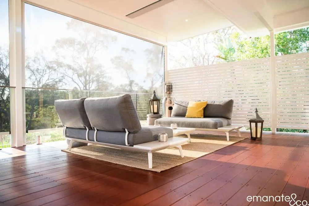 A light-toned lined patio ceiling with a modern fan, creating a cool outdoor living room in Pymble.