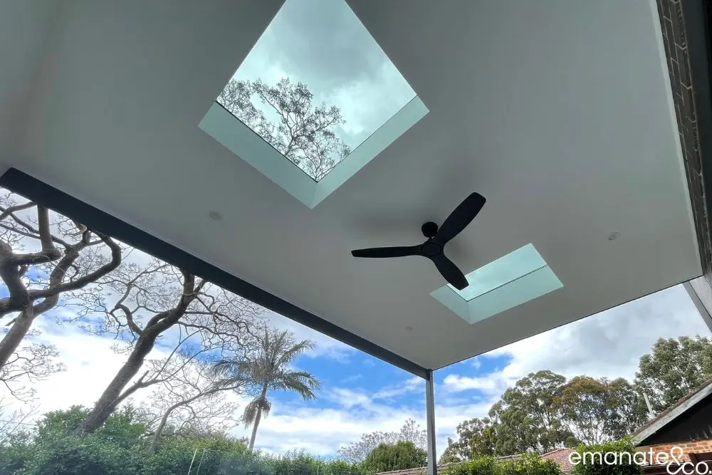 Close-up detail of a dark-toned ceiling lining outdoor with a fan, enhancing a Thornleigh patio.