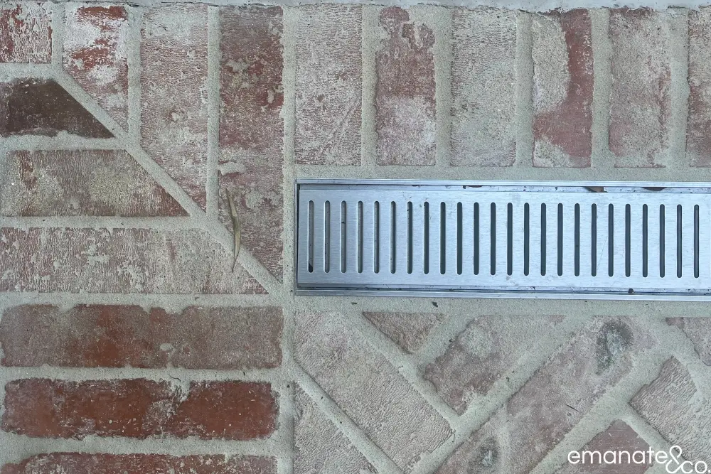 A close shot of a french patten, tiled deck in BAL FZ with recycled bricks in Roseville.
