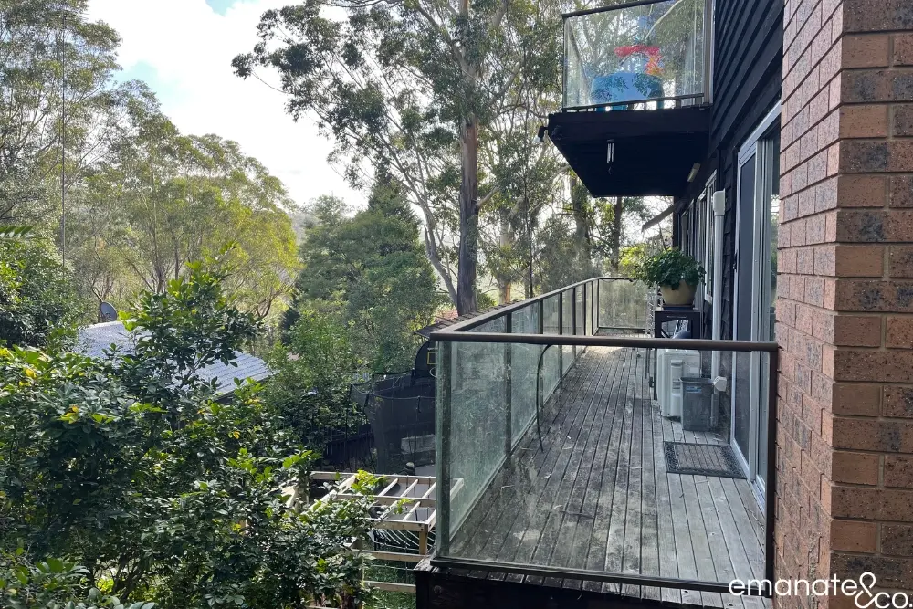 Old weathered timber deck, juliet balcony in a Hornsby bushfire zone