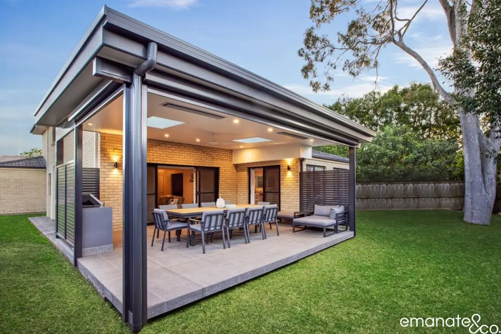 Modern grey tiled decking connecting a home to a new backyard, a common solution in West Pennant Hills.