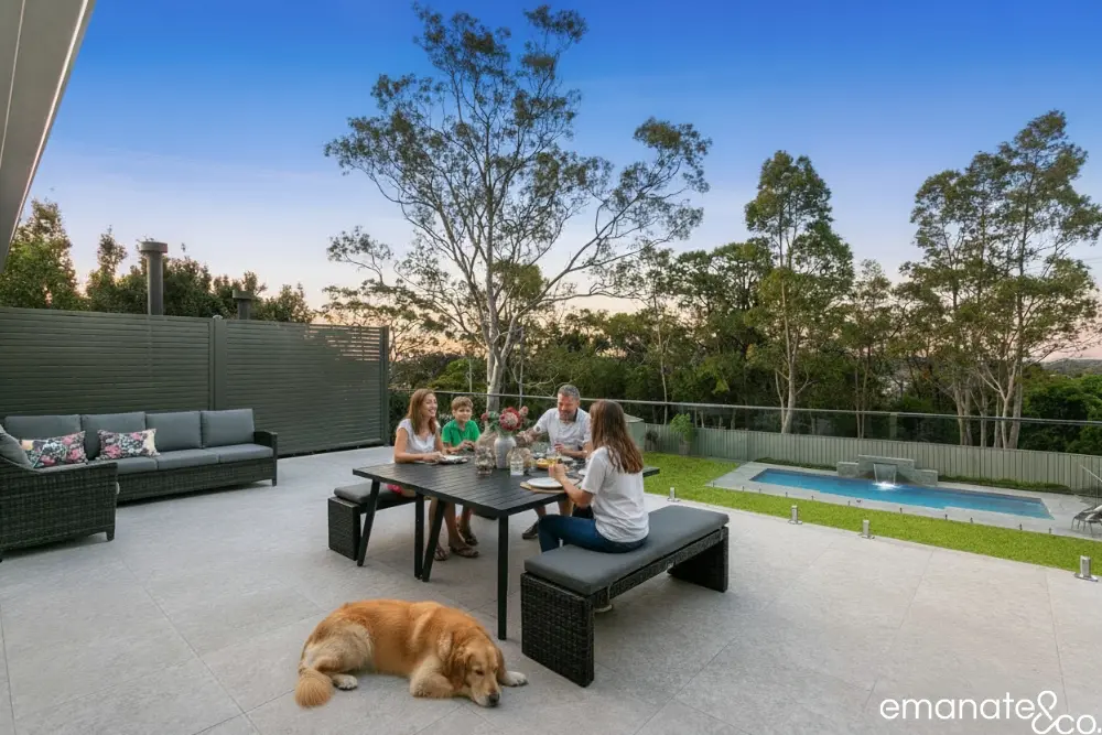 Elegant outdoor room with a tiled deck floor, built for a Berowra home in BAL FZ.