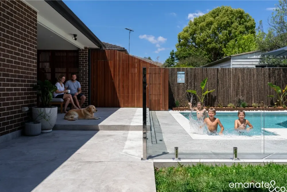 A beautifully styled poolside alfresco area, with tiled flooring, designed for a Thornleigh home.