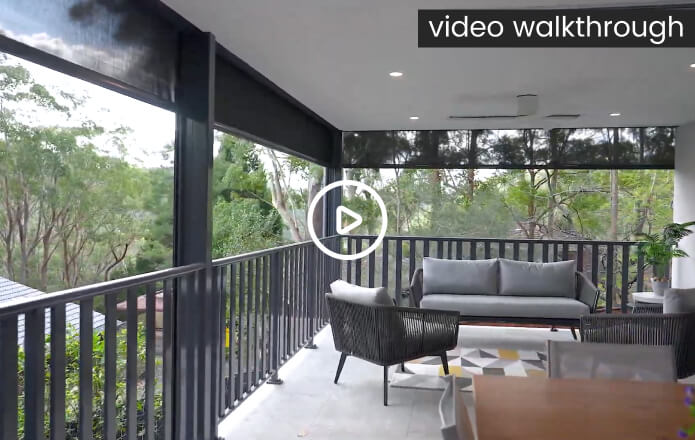 Video walkthrough thumbnail of covered balcony with outdoor lounge and treetop views
