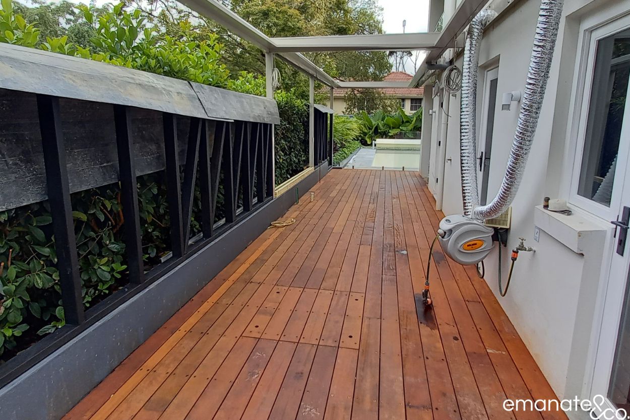 New hardwood deck and patio cover framing under construction beside a swimming pool at this Wahroonga outdoor living project.