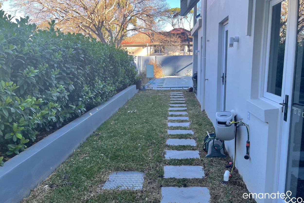 Existing Wahroonga side garden and stepping-stone pathway before its transformation into a hardwood deck and covered outdoor entertaining space.