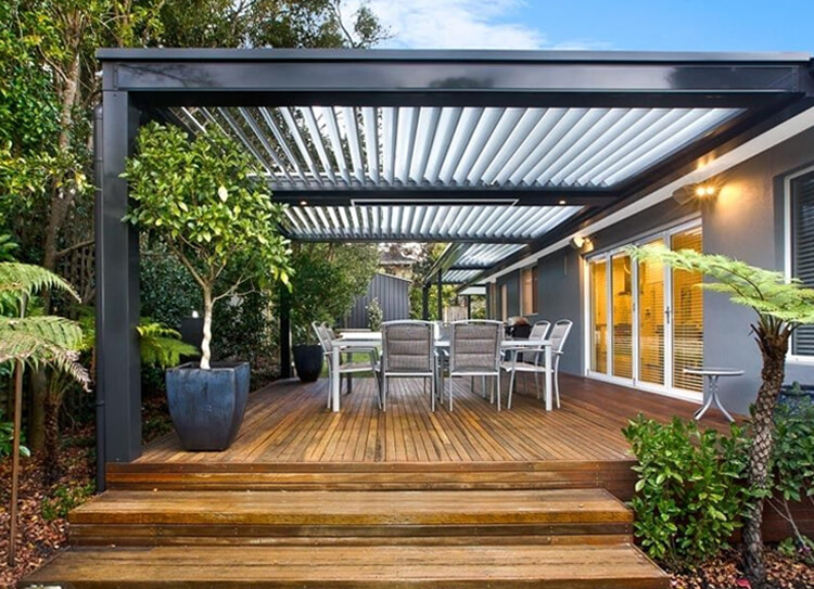 Custom Eclipse opening louvered patio cover on elevated timber deck in St Ives by Emanate and Co.